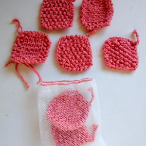 Hand-knit face scrubbies – coral